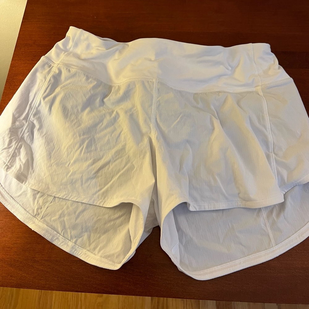 One Lululemon shorts size 8 Tall.